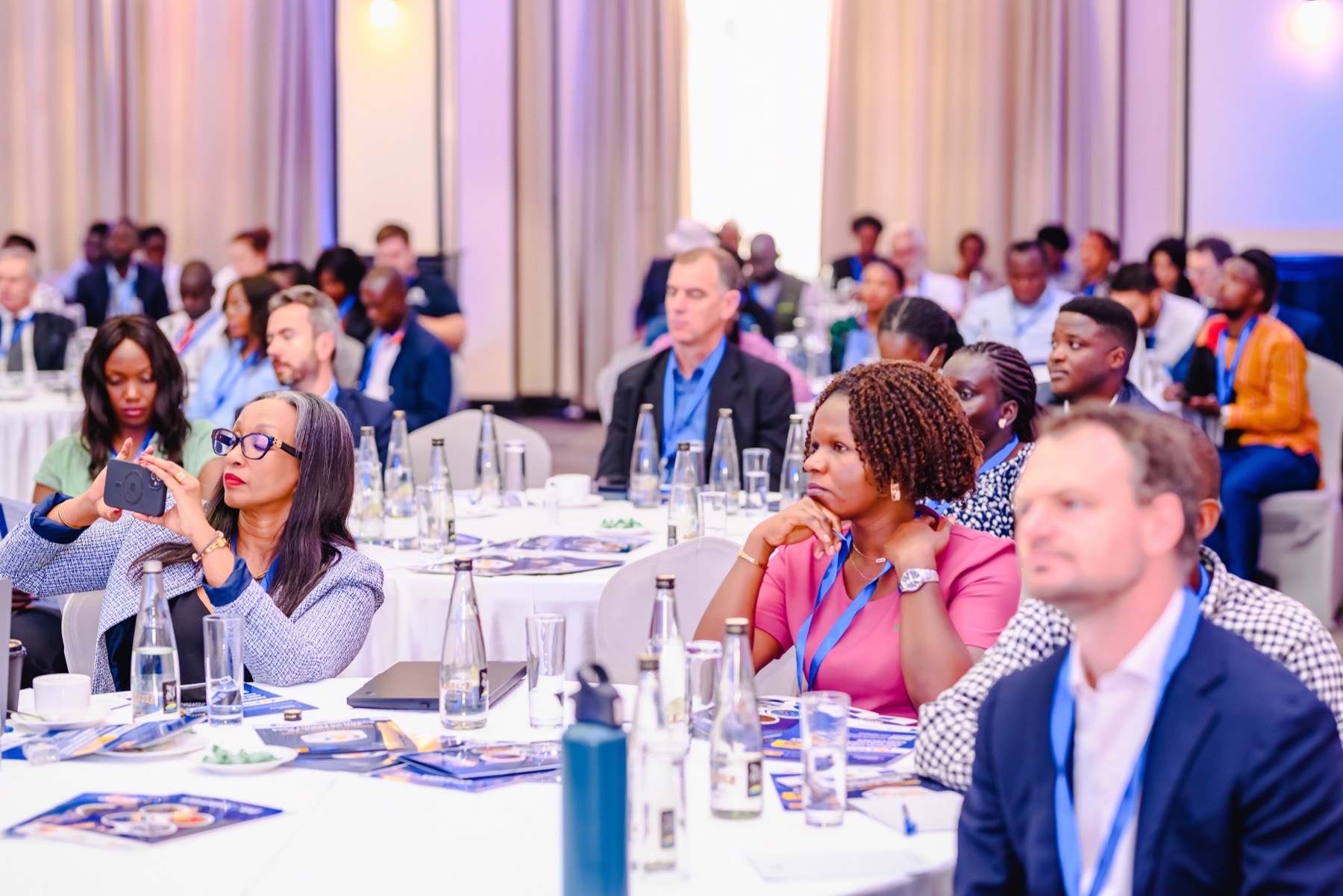 Conference delegates listening during a professional session