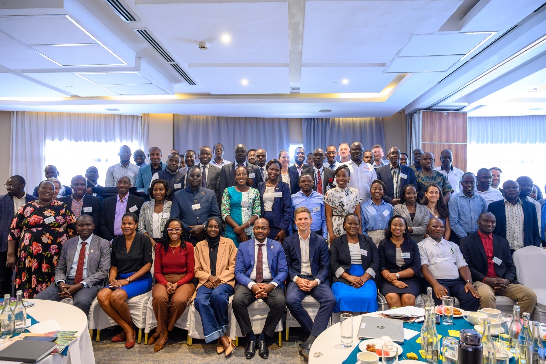Corporate conference attendees gathered for a group photograph