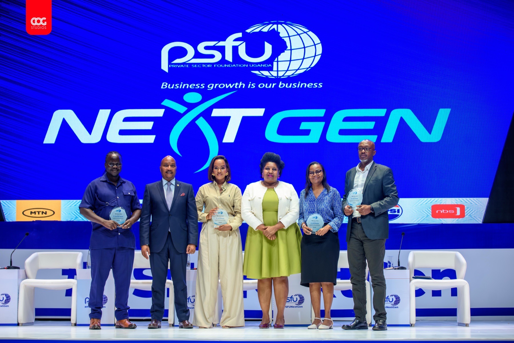PSFU NextGen award recipients standing together on stage