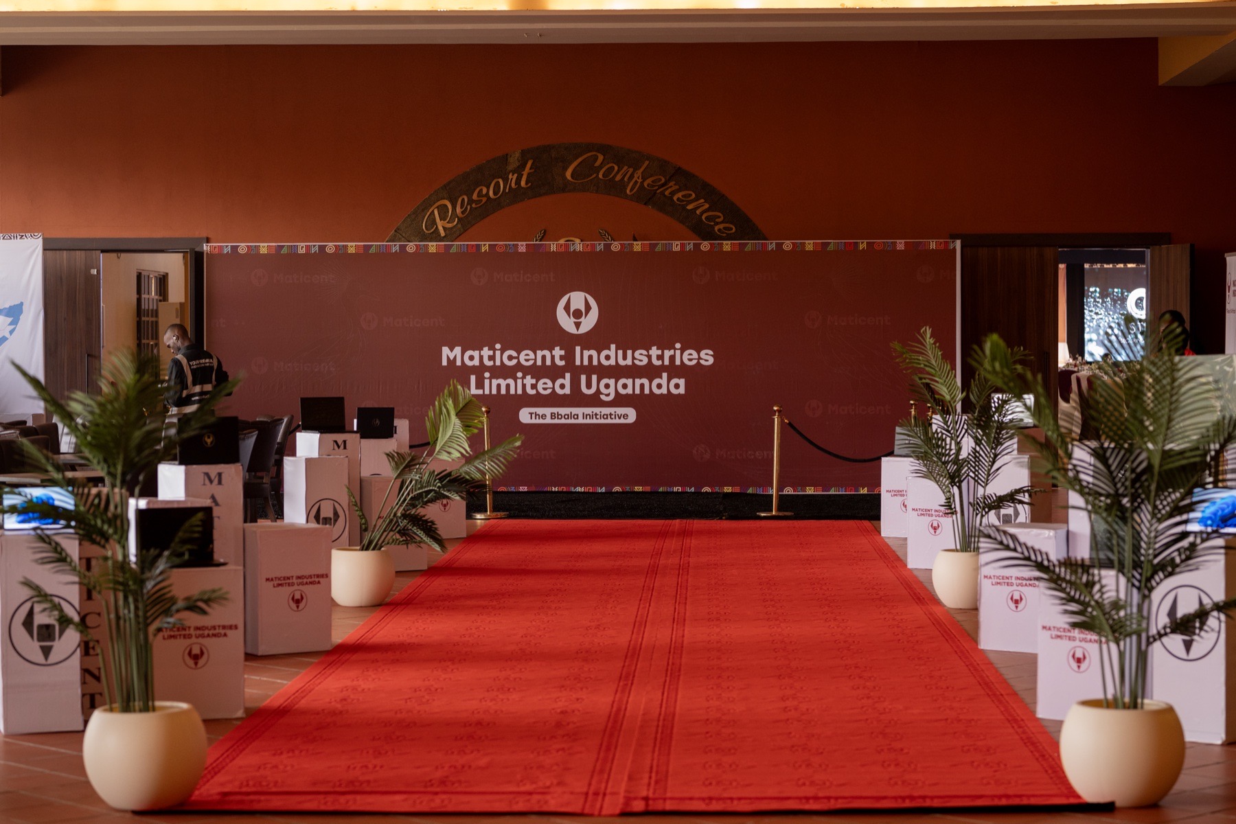 Maticent Industries event entrance with branded red carpet and decor